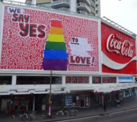 The iconic Kings Cross Coca-Cola billboard is saying Yes to Love